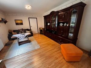 a living room with a couch and a table at Idylle Ostsee in Buggenhagen