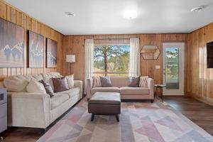 a living room with two couches and a tv at Pondside Lodge BHBungalows #5 in Custer +63 photos