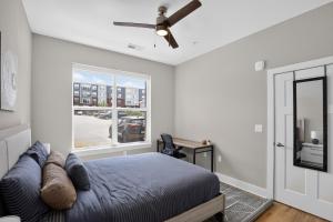 a bedroom with a bed and a window at Homey 2BR with Great Space in Greer