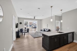 a kitchen and living room with a sink and a counter at Homey 2BR with Great Space in Greer