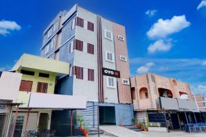 a building with anovo sign on the side of it at Hotel O Rainbow in Warangal +23 photos