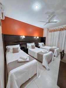 Llit o llits en una habitació de Hotel Ciudad 56 fotos més