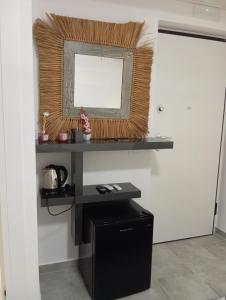 a room with a black desk and a window at Villa Maldera-case vacanza-loft- loft queen specchio in Trani +57 photos
