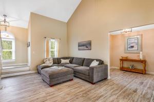 a living room with a couch and a table at Heh Edisto in Edisto Beach