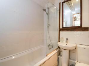 a bathroom with a sink and a toilet and a shower at Ivy Cottage in Bath +23 photos