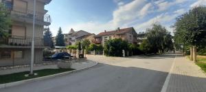 an empty street in a city with buildings at 10Forward apt2 in Bitola +6 photos