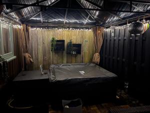 a room with a bed in a room with lights at Haus Rottkäppchen in Extertal +45 photos
