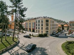 an aerial view of a street in a city at Salt Square Residence in Tuzla