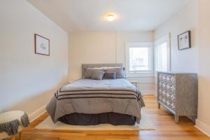 a bedroom with a bed and a window at Sleeps 10 Walkable to Everything Pets Game Room in Salida