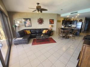a living room with a couch and a table at Sonoran Sea 2 Bedroom 2 Bath 7th Floor in Puerto Peñasco