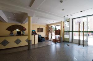 Uma área de estar em Hotel Solneve