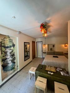 a bedroom with a bed and a table at La Radura in Roccamorice