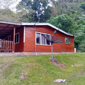 a house with a basketball hoop in front of it at PELLY Homestay Explorer in Vunivuthea
