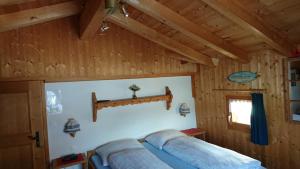 Postel nebo postele na pokoji v ubytování B&B Haus im Sand