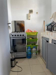 O bucătărie sau chicinetă la Studio
