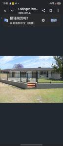 a picture of a building with a bench on it at Nice quite stay in Perth