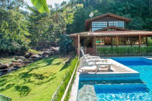 A piscina localizada em Pousada Caminho das Candeias ou nos arredores