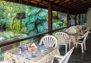 Um jardim em Pousada Caminho das Candeias