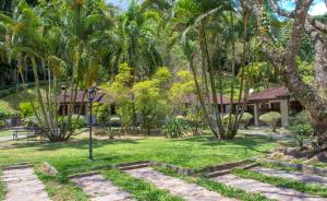 Um jardim em Pousada Caminho das Candeias