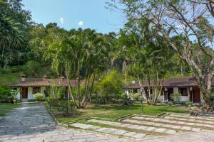 Um jardim em Pousada Caminho das Candeias