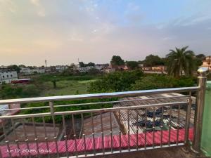 a view of a city from a balcony at Shri chitrakoot homestay in Chitrakoot +14 photos
