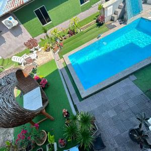 an overhead view of a swimming pool in a yard at TC Maya Abaya Hotel in Kuantan +40 photos