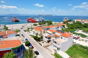 an aerial view of a city with boats in the water at Porto Nuovo Studio 2 in Limenas