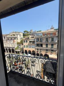 a view of a city from a balcony at Happy Haven al mare in Riviera in Chiavari