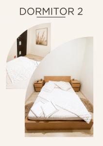 two beds in a room with the words durator at Casa M&R in Bucharest