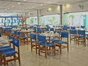 Un restaurant u otro lugar para comer en Hotel Guadaira Resort