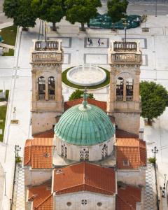 an overhead view of a building with a green dome at NYX Guesthouse in Tripoli