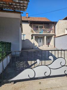 a view of a house from the balcony at Apartman Edis i Elma in Visoko