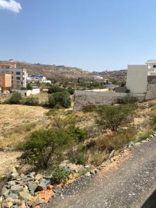 a view of a city from the side of a road at Highland Residence Al namas in Lahbey
