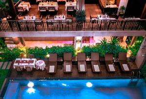 an overhead view of a restaurant with a pool at Indra Angkor Hotel in Siem Reap
