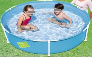 two children playing in a trampoline in the water at Casa Solana in Cambil +9 photos