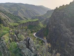 a view of a canyon with a winding mountain road at Guest House in Garni +7 photos