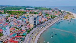 an aerial view of a city with a beach at NGỌN HẢI ĐĂNG Hotel in Dong Hoi
