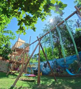 a playground in a park with a slide at The Retreat in Panglao Island