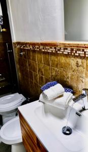 a bathroom with a sink and a toilet at B&B Don Nicola in Bonefro +24 photos