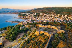 an aerial view of a city and a body of water at Skalopetra in Pylos