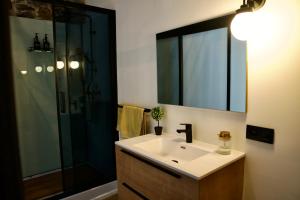 a bathroom with a sink and a shower at Loft urbain style Brooklyn in Profondeville +45 photos