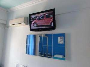 TV a/nebo společenská místnost v ubytování Botsis Guest House + 20 fotografií