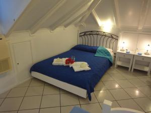 Postel nebo postele na pokoji v ubytování Botsis Guest House