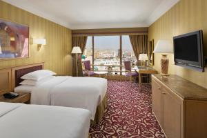 TV a/nebo společenská místnost v ubytování Makkah Hotel