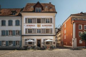 an old building with an antwerp amsterdam written on it at Auberge du Mouton in Porrentruy