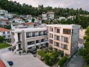 an overhead view of a building in a city at APART-HOTEL PRESiDENT 2 in Ulcinj
