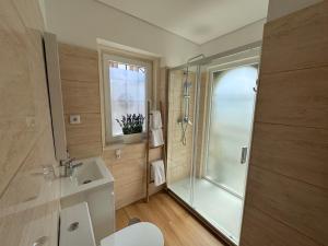 a bathroom with a shower and a sink at Luna Navegante in Porto +106 photos