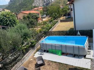 an overhead view of a swimming pool in a yard at Valentinas retreat in San Dorligo della Valle
