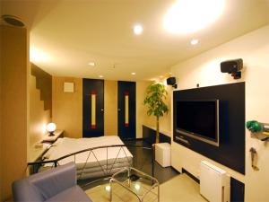 تلفاز و/أو أجهزة ترفيهية في Hotel RR (Adult Only)