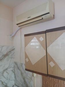 a kitchen with a counter top with a window at Aleksinac Centar Two-Bedroom Apartment in Aleksinac +41 photos